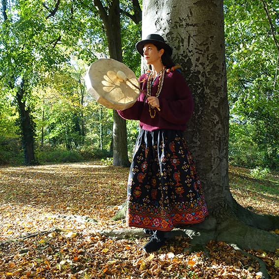 photo of therapist Susanne Stauch with ceremonial drum